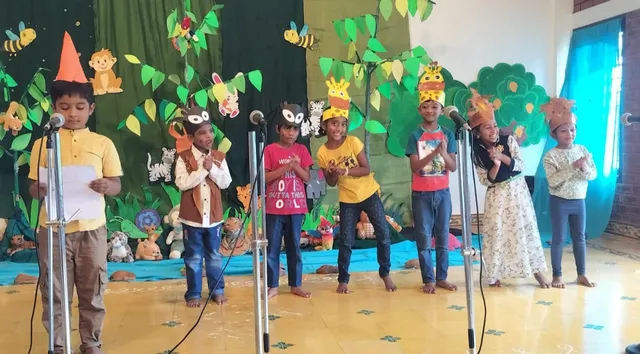 Grade 1 Theatre Activity 5_result First graders at Vidhya Peetham i-School dressed in animal and bird headbands for the White Elephant Theatre Activity, showcasing skits for 1st graders.