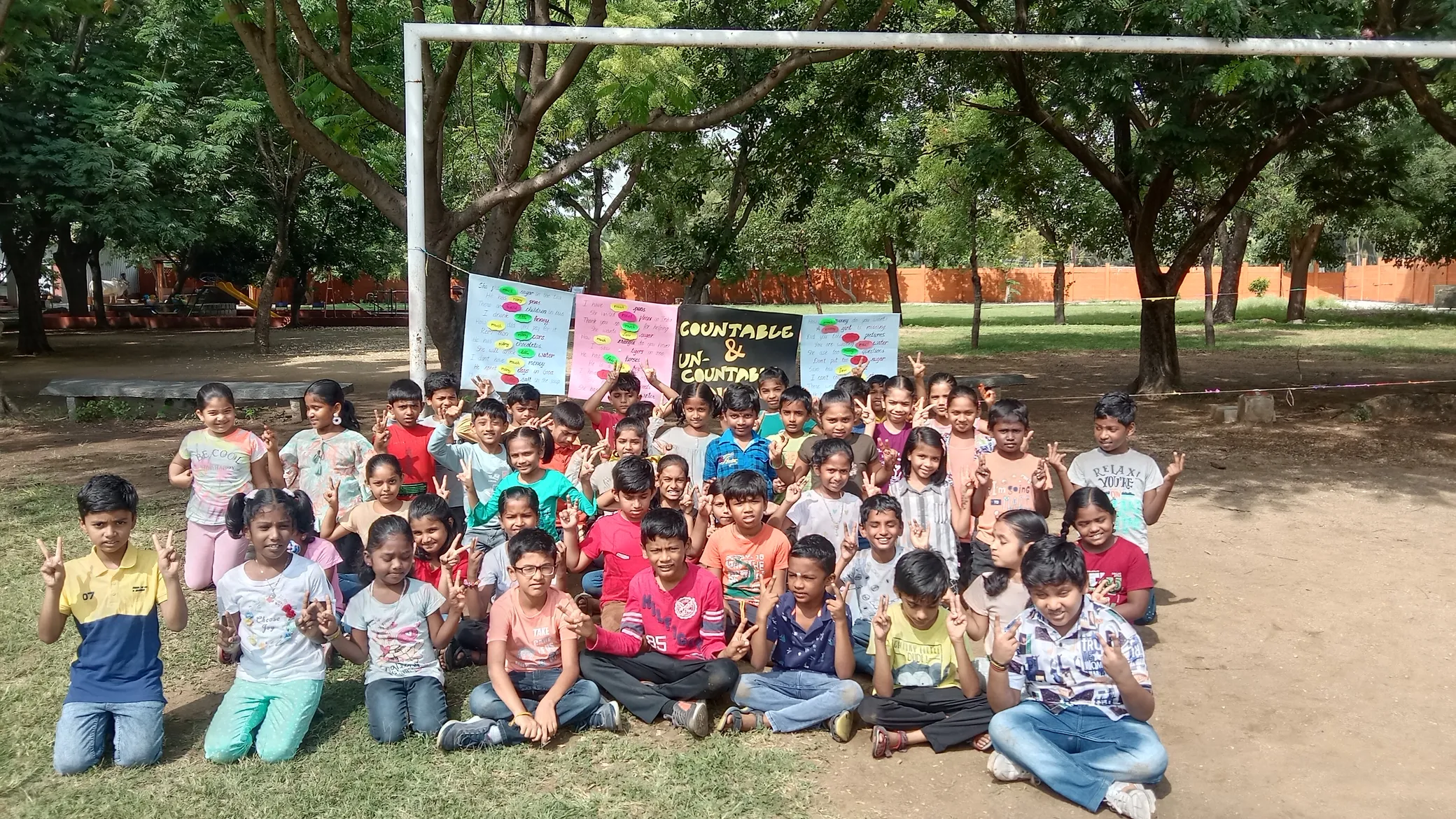 Completed English grammar worksheets with 'few', 'little', 'much', 'many' correctly filled in by Grade 3 students at a leading Salem CBSE school.