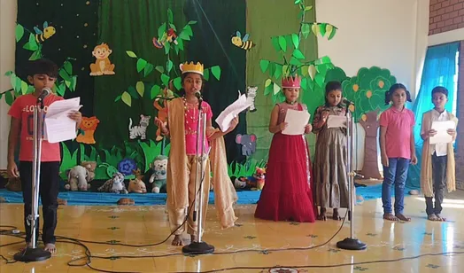 Enthusiastic 3rd-grade students at Vidhya Peetham i-School, Salem, wearing creative animal headbands for their English skit activity.