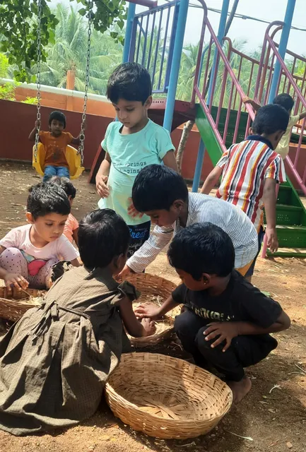 PreKG students at Vidhya Peetham i-School in Salem eagerly exploring 'Akash Malli' flowers during their Nature Watch activity.