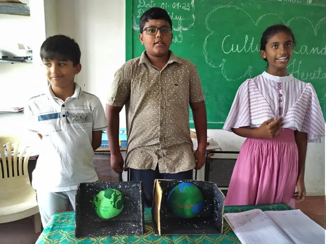 Confident Grade 8 students explaining their globe models during a cultural expo in one of the best schools in Salem.