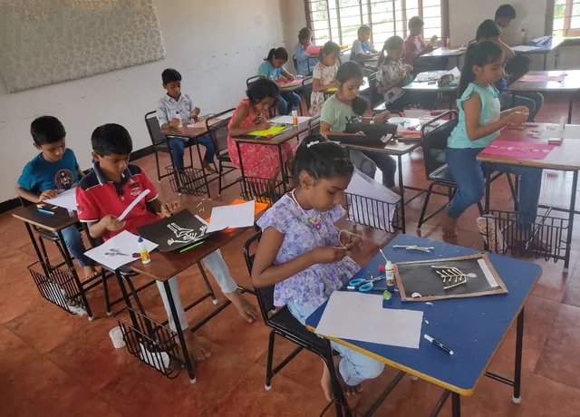 Grade 4 students engaged in a skeleton-making class activity at a CBSE school in Salem.