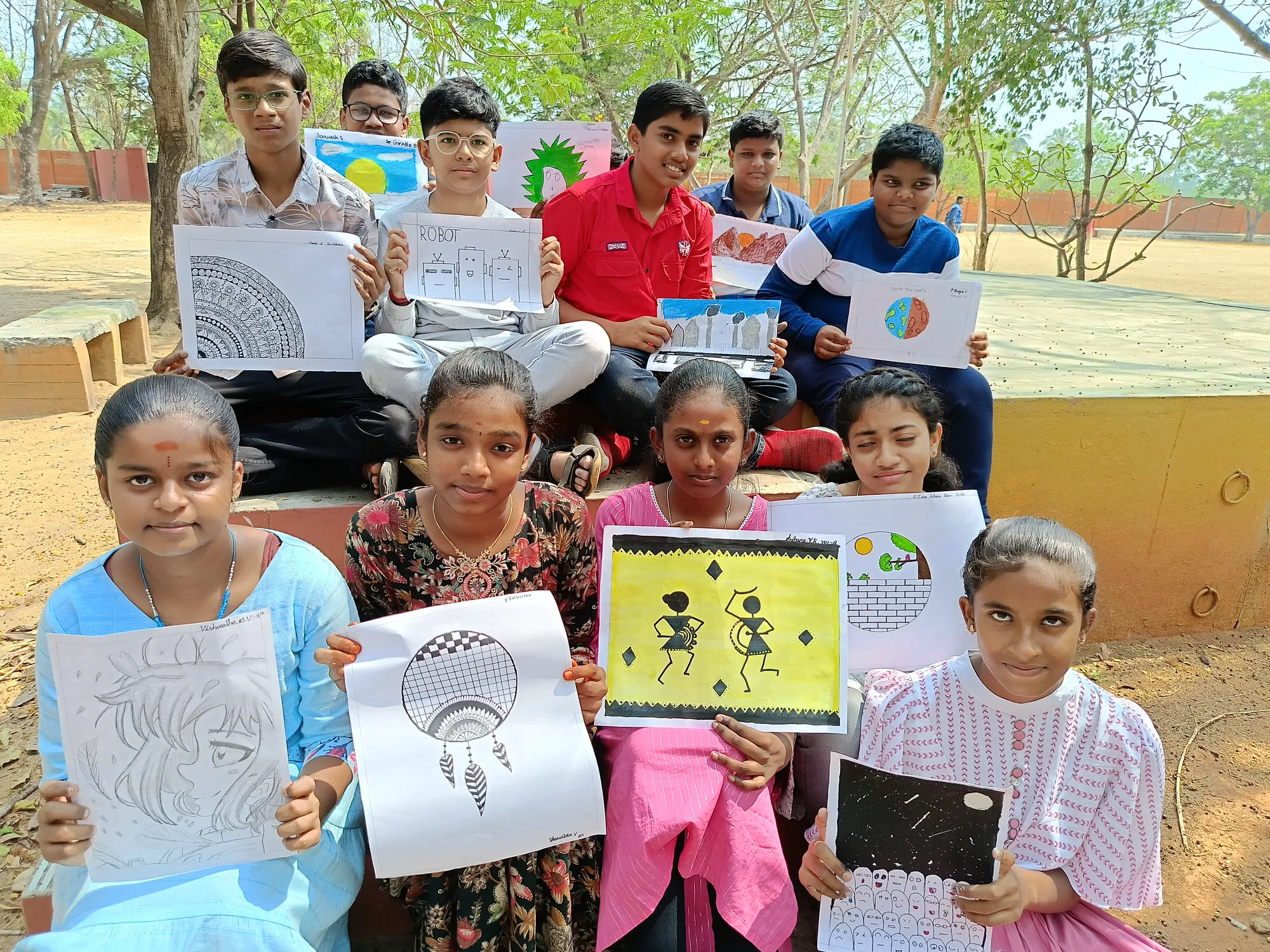 Grade 6 to 9 students proudly showcasing their art projects at Vidhya Peetham i-School's Brush and Beyond event