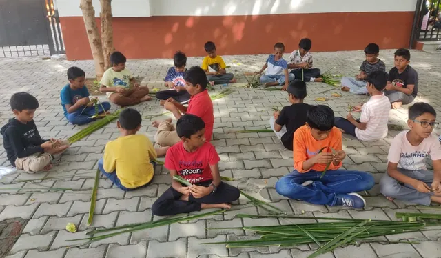 Grade 4 students creating coconut leaf crafts at a CBSE school in Salem.