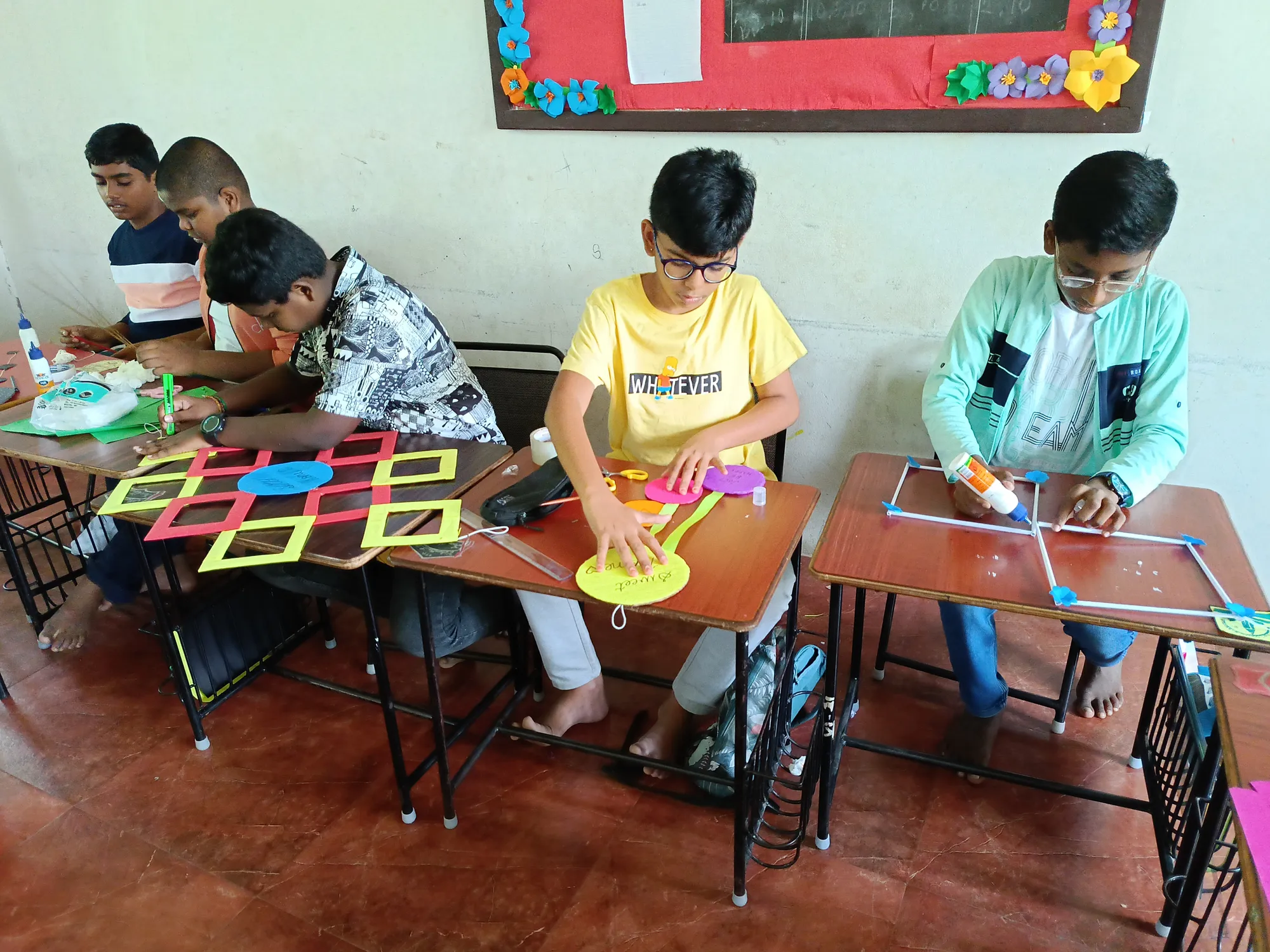 Students crafting unique, creative wall decorations in a creative classroom activity.