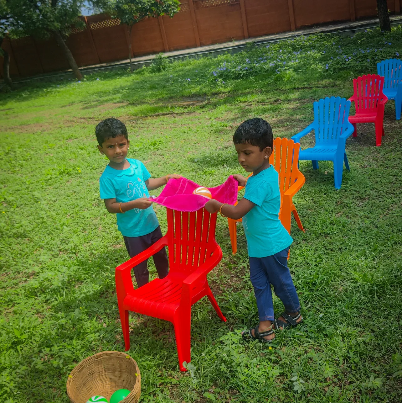 Young learners of Vidhya Peetham i-School working in pairs to balance a ball in a fun-filled gross motor skills exercise.