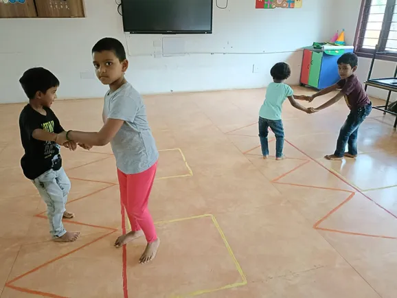 UKG kids learning teamwork during the Walk the Line activity.