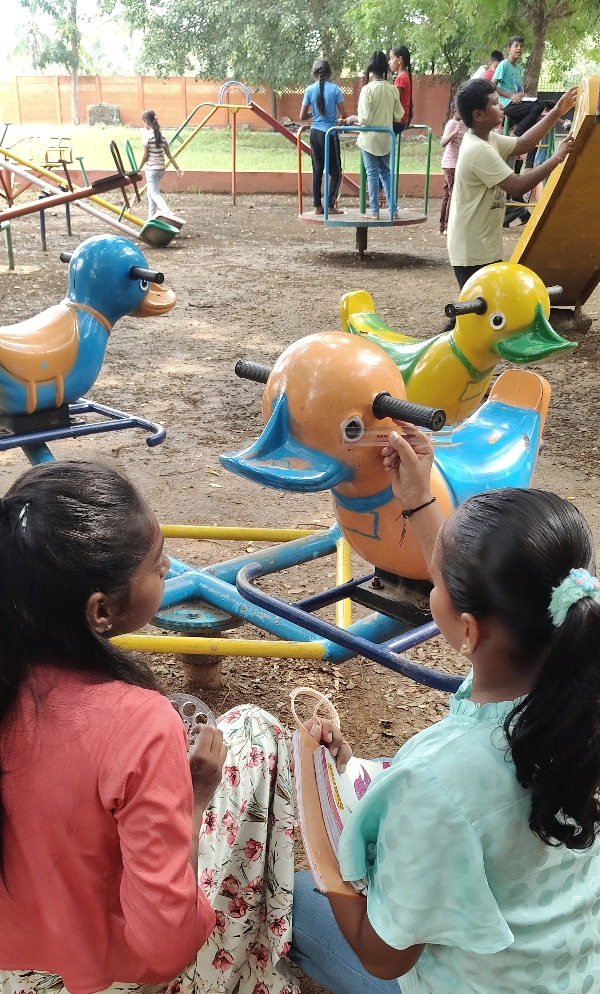 Students calculating the circumference of playground equipment at a CBSE school in Salem.