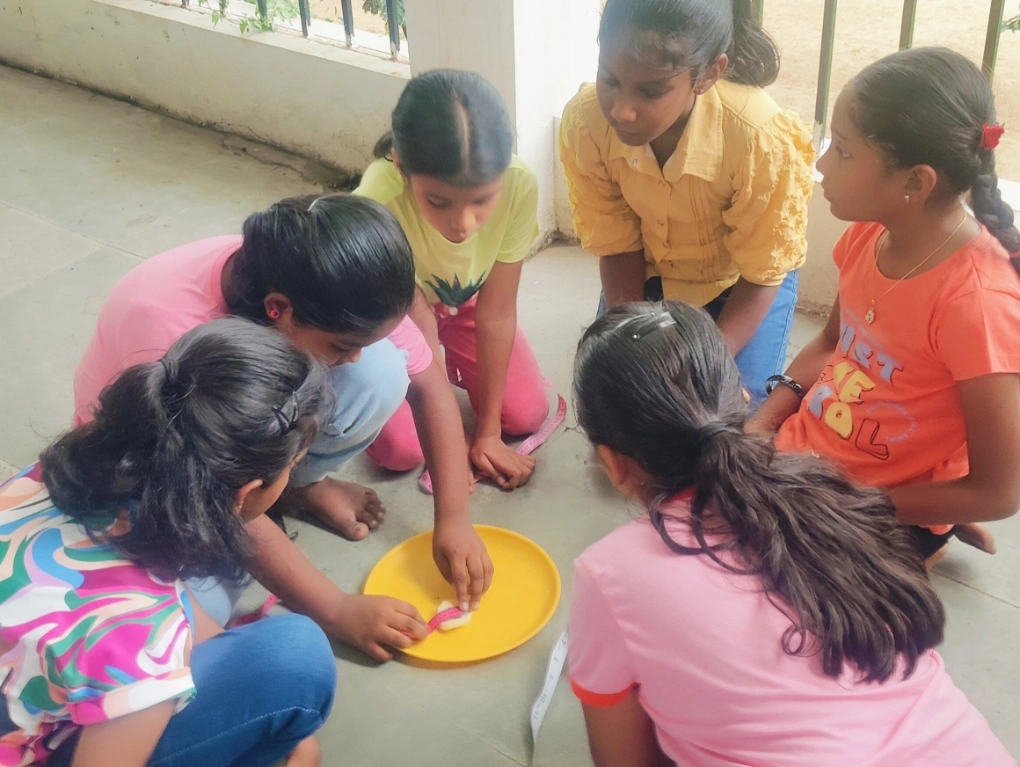 Children measuring during a radius and diameter activity