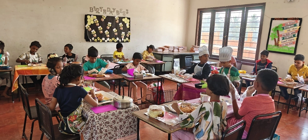 Wide view of classroom showing engaged students during hands-on fraction activity