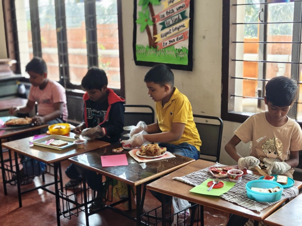 Student enjoying the practical application of fractions through food division